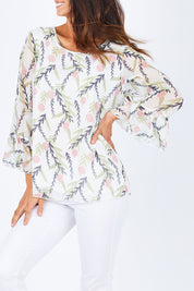 Model Gemma wearing size S of the Vine Print Top in colour WhiteMulti (White), from the front, cropped image