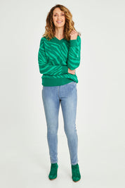 Model Emma wearing size S of the Reversible Jean in colour Denim (Blue), from the front, showing the whole outfit