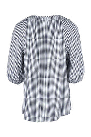 Product shot of the Check It Out Top in colour Navy (Blue), from the back