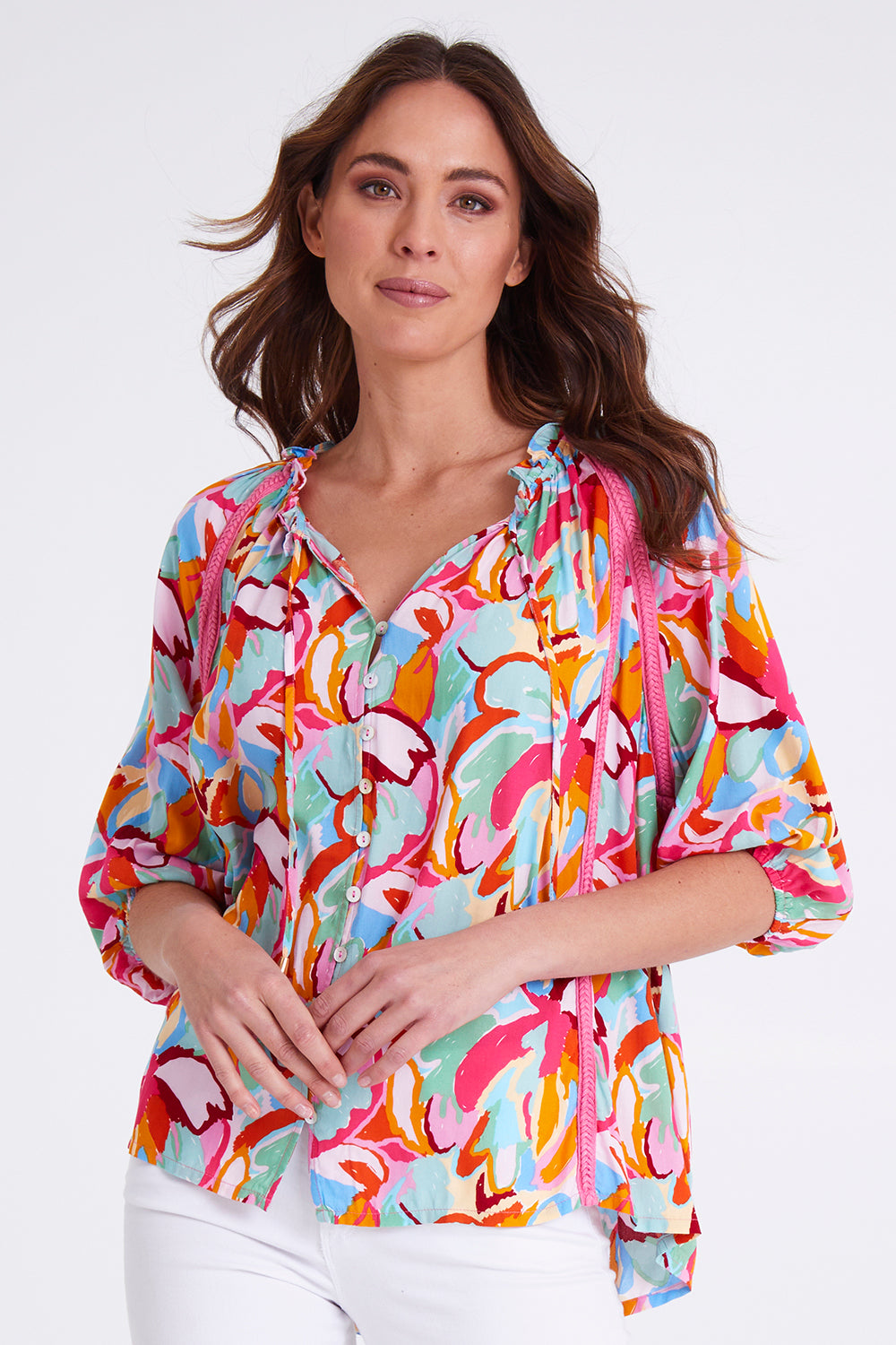 Model Madeline wearing size S of the Monet Top in colour Multi (Pink), from the front, cropped image