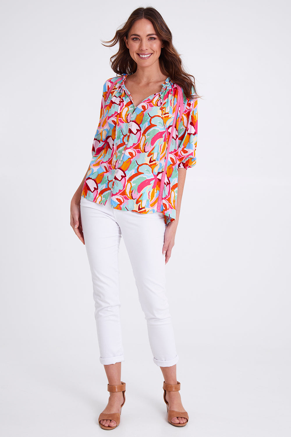 Model Madeline wearing size S of the Monet Top in colour Multi (Pink), from the front, showing the whole outfit