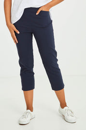 Model Olivia wearing size S of the Zara Pant in colour Navy (Blue), from the front, cropped image