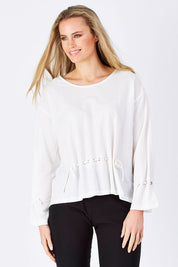 Model Maddy wearing size S of the Front Thread Top in colour White (White), from the front, cropped image