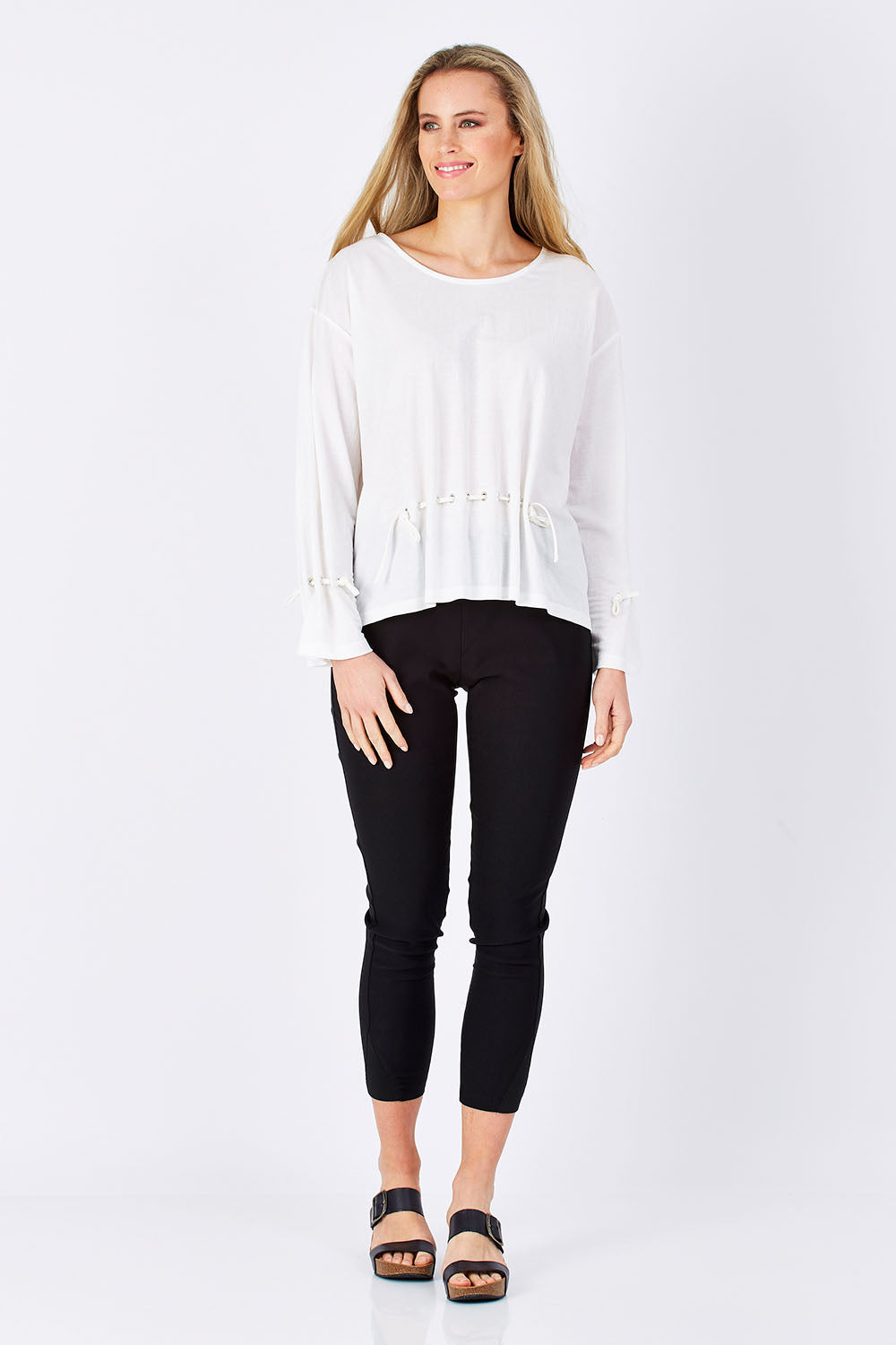 Model Maddy wearing size S of the Front Thread Top in colour White (White), from the front, showing the whole outfit