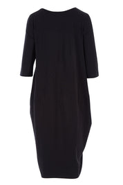 Product shot of the Curved Seam Dress in colour Black (Black), from the back