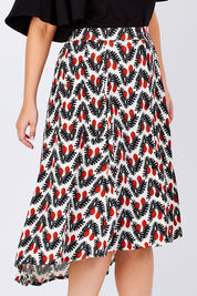 Model Jess wearing the Ayna Skirt in colour BayamCream, from the front, cropped image