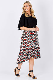 Model Jess wearing the Ayna Skirt in colour BayamCream, from the front, showing the whole outfit