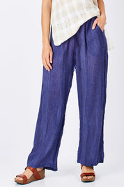 Model Anna wearing size S of the Monte Pant in colour Navy (Blue), from the front, cropped image
