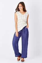 Model Anna wearing size S of the Monte Pant in colour Navy (Blue), from the front, showing the whole outfit