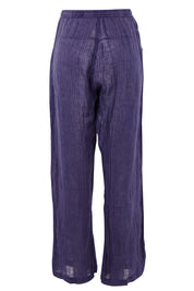 Product shot of the Monte Pant in colour Navy (Blue), from the back