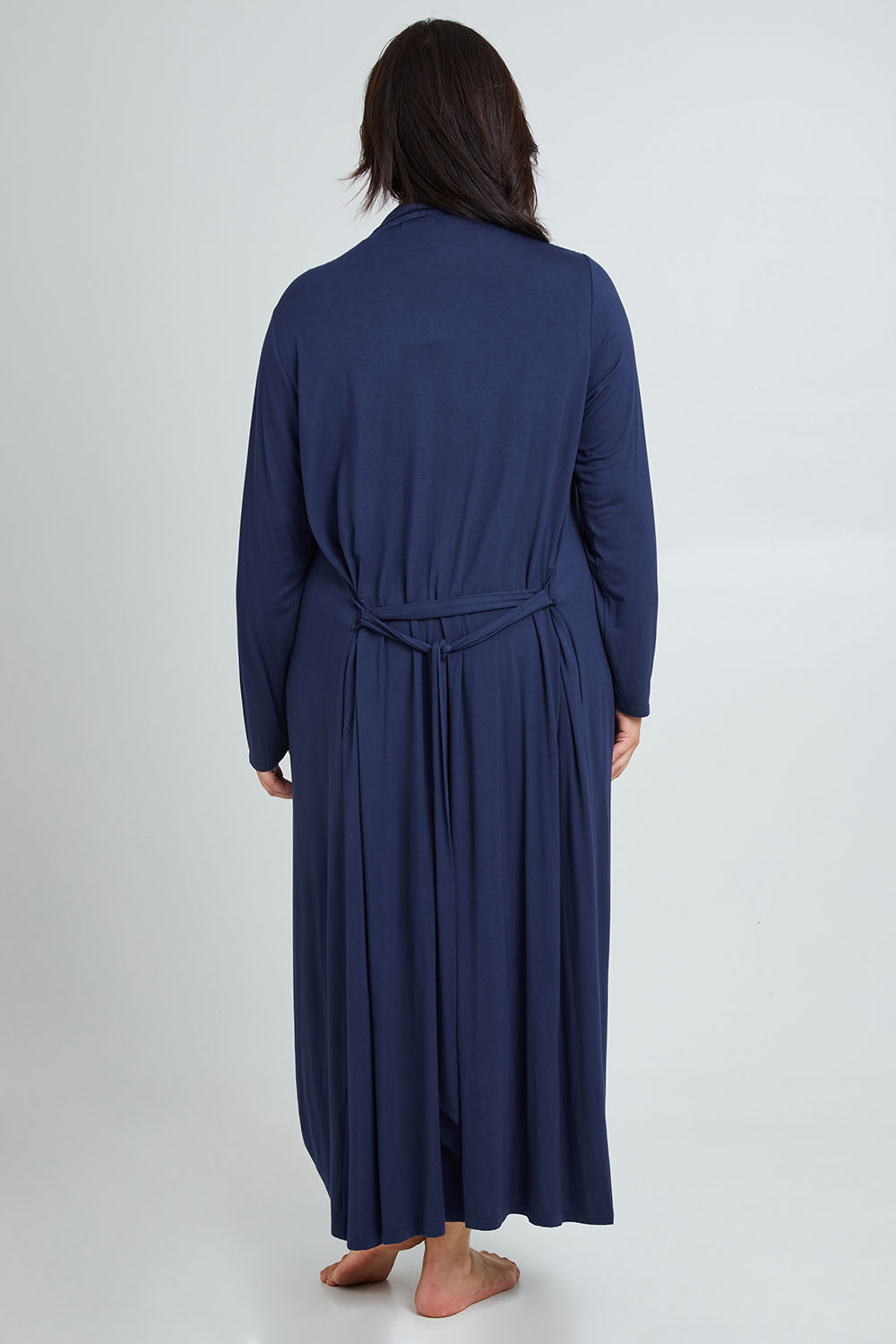 Model Poppy wearing the Jersey Wrap Maxi Cardi in colour Denimblue (Blue), from the back