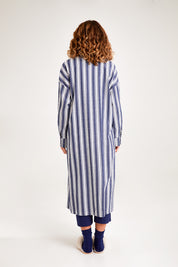 Model Emma wearing the Oversized Cotton Linen Sleep Shirt in colour Navystripe (Blue), from the back