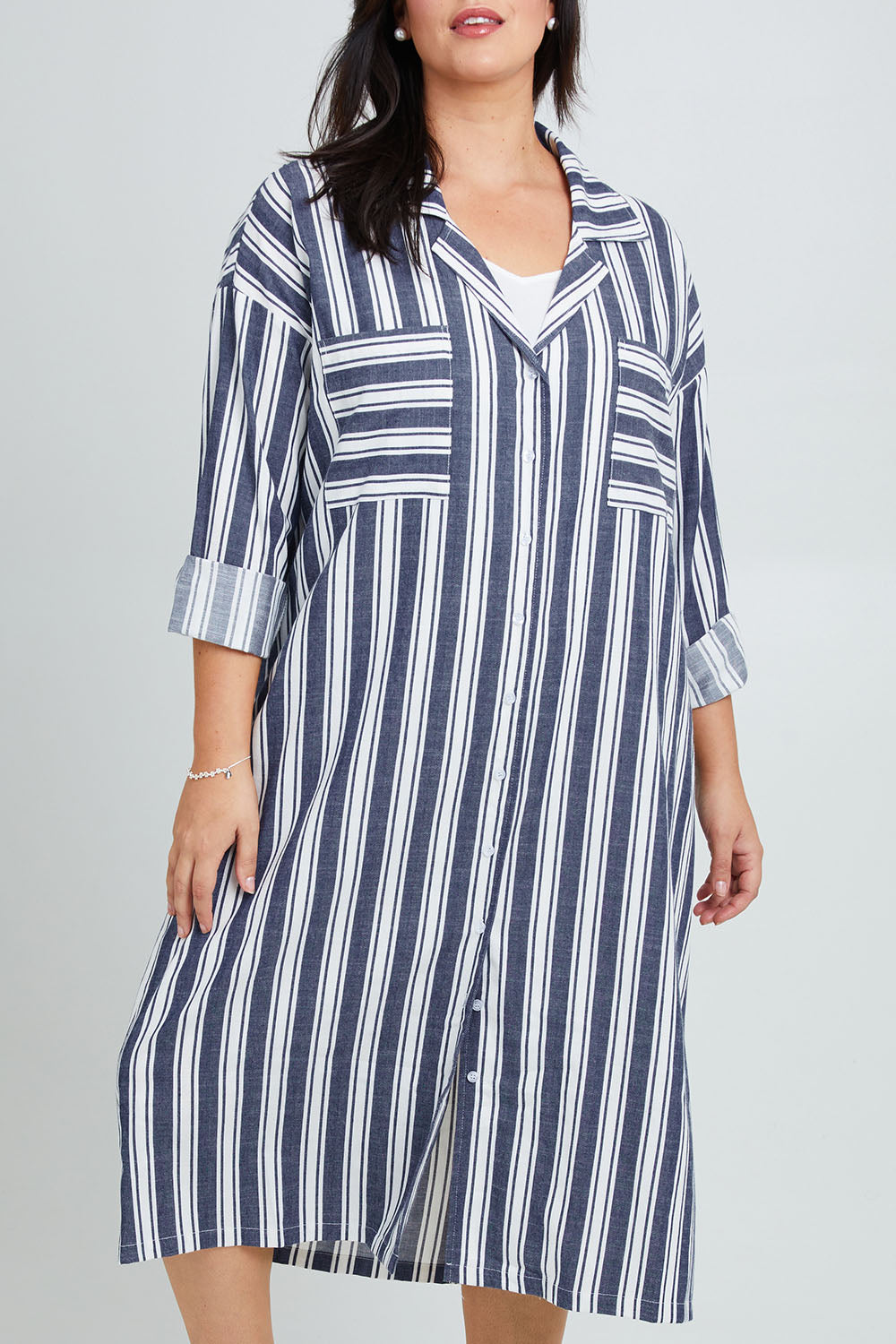 Model Poppy wearing the Oversized Cotton Linen Sleep Shirt in colour Navystripe (Blue), from the front, cropped image