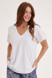 Model Sally wearing the Cotton Jersey V Neck Tee in colour White (White), from the front, cropped image