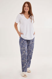 Model Sally wearing the Cotton Jersey V Neck Tee in colour White (White), from the front, showing the whole outfit
