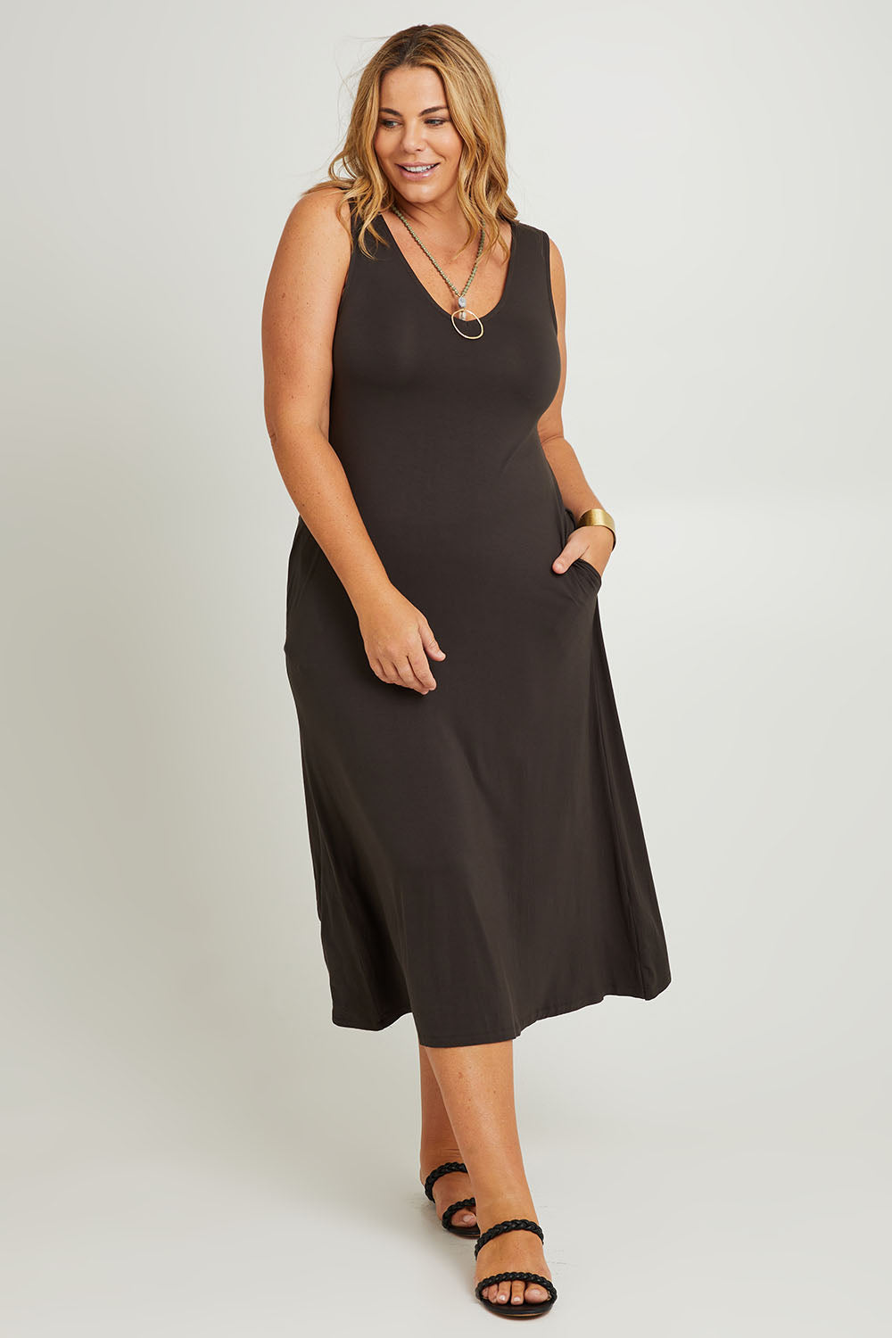 Model Fiona wearing the Modal Back Wrap Midi Dress in colour Deepgreen (Green), from the front, showing the whole outfit