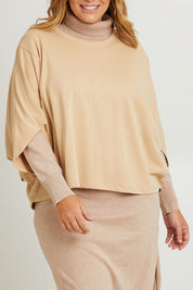 Model Fiona wearing the Cotton Terry Batwing Sweater in colour Porridge, from the front, cropped image