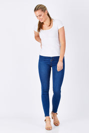 Model Maddy wearing size 10 of the Diana Skinny in colour Denim (Blue), from the front, showing the whole outfit