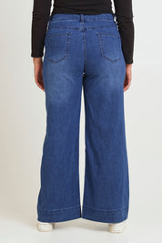 Model Chanel wearing size 16 of the Katie Highin colourWaisted Front Pocket Wide Leg Jean - Darkdenim (Blue), from the back