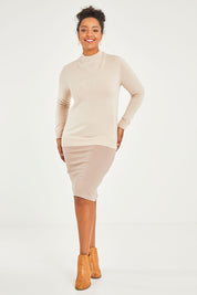 Model Noli wearing size 14 of The Ponte Knee Length Pencil Skirt in colour Beige, from the front, showing the whole outfit