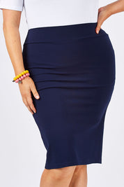 Model Ljubenka wearing size 18 of The Ponte Knee Length Pencil Skirt in colour Navy (Blue), from the front, cropped image