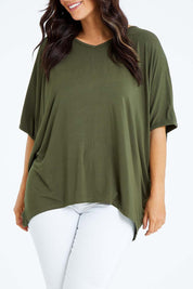 Model Laura wearing size OneSize of the Vin colourNeck Bamboo Drape Top - Olive (Green), from the front, cropped image