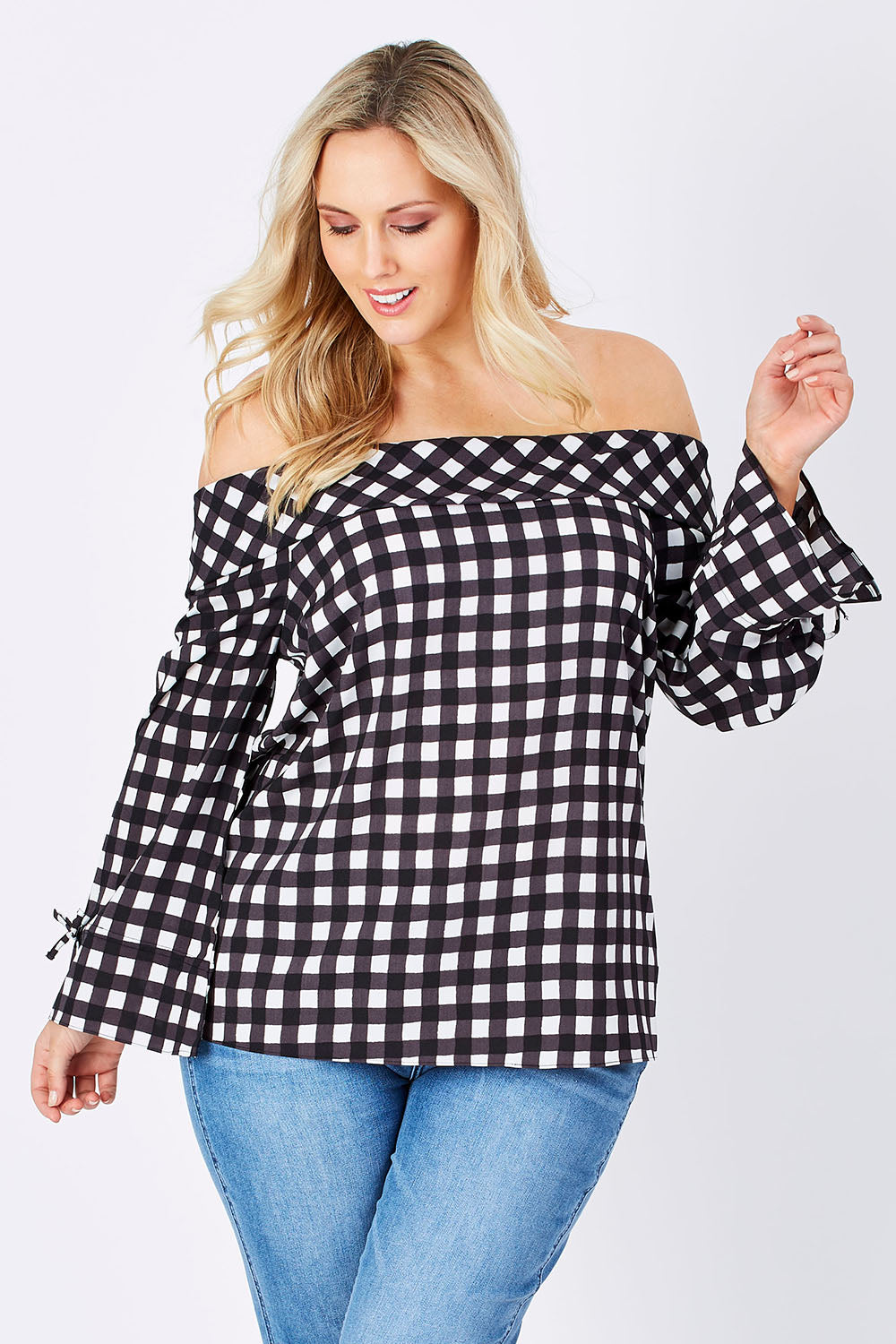 Model Jess wearing size 14 of the Picnic Top in colour BlackWhite (Black), from the front, cropped image