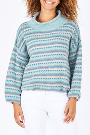 Model Summer wearing size S of the Fairisle Pullover in colour IceCombo (Blue), from the front, cropped image