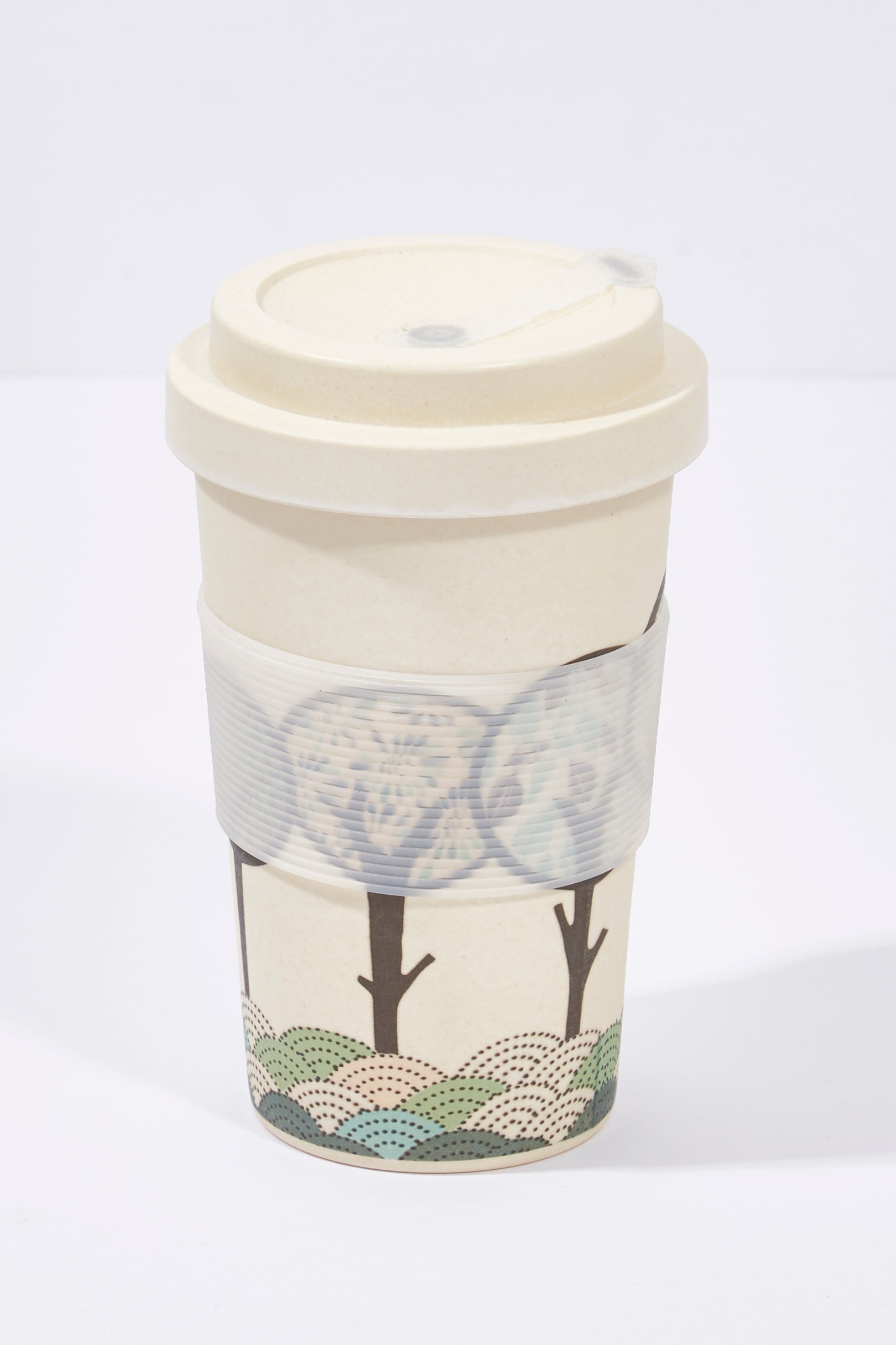 A model wearing size OneSize of the Bamboo Printed Ecup Coffee Cup in colour RoundTree, from the front, showing the whole outfit