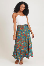 Model Ziara wearing size OneSize of the Grace Cotton Wrap Skirt in colour Valla, from the front, showing the whole outfit