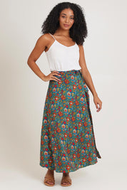 Model Ziara wearing size OneSize of the Grace Cotton Wrap Skirt in colour Valla, from the front, showing the whole outfit