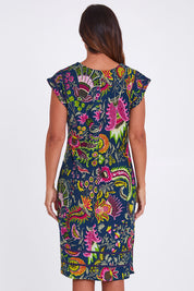 Model Alex wearing size S of the Cassy Dress in colour Irisprint (Blue), from the back