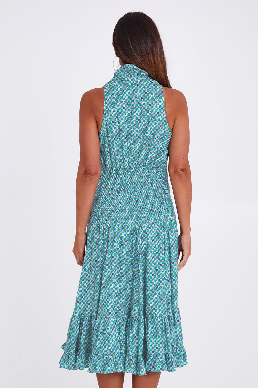 Model Alex wearing the Polly Dress in colour Emmaprint (Blue), from the back