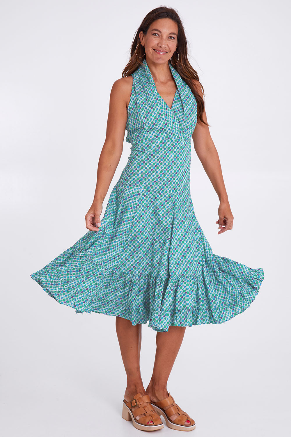 Model Alex wearing the Polly Dress in colour Emmaprint (Blue), from the front, showing the whole outfit