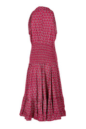 Product shot of the Polly Tiered Dress in colour Corfu (Red), from the back