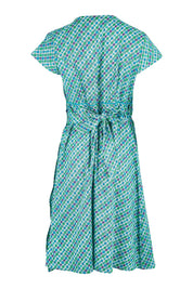 Product shot of the Astrid Dress in colour Emmaprint (Blue), from the back