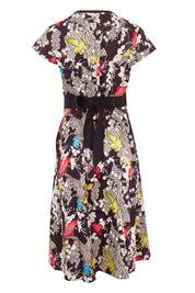Product shot of the Leela Print Cotton Wrap Dress in colour Nikko (Black), from the back