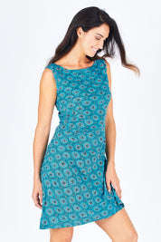 Model Gemma wearing size S of the Camden Tunic in colour Stamp (Blue), from the front, cropped image