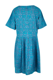 Product shot of the Billie Dress in colour Berlin (Blue), from the back