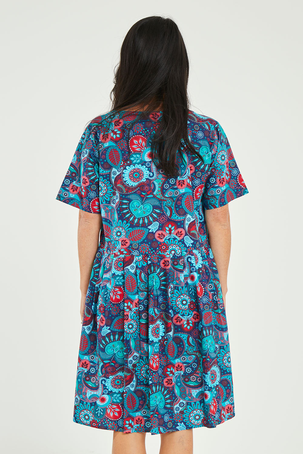 Model Katie wearing size S of the Billie Dress in colour Tinaprint (Blue), from the back