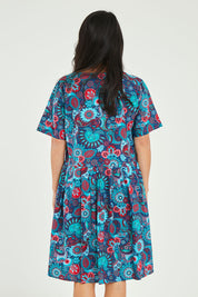 Model Katie wearing size S of the Billie Dress in colour Tinaprint (Blue), from the back