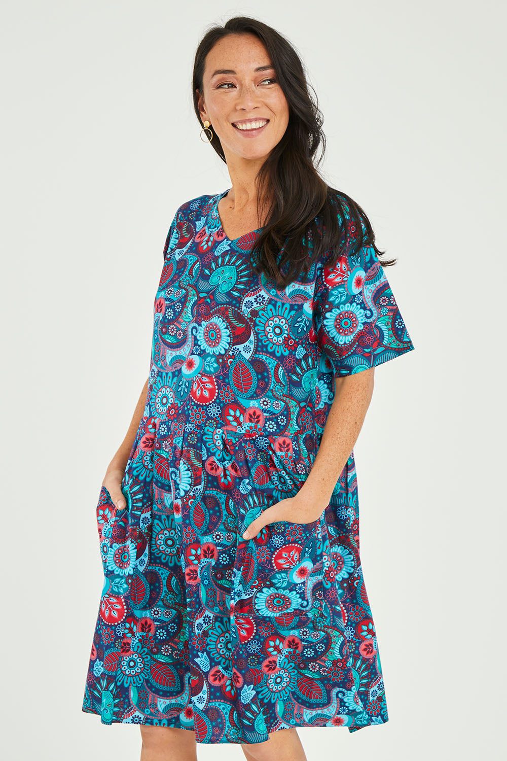 Model Katie wearing size S of the Billie Dress in colour Tinaprint (Blue), from the front, cropped image