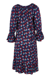 Product shot of the Valeria Dress in colour Soho (Blue), from the back