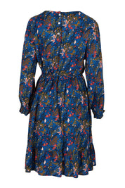 Product shot of the Rome Dress in colour Corsica (Blue), from the back