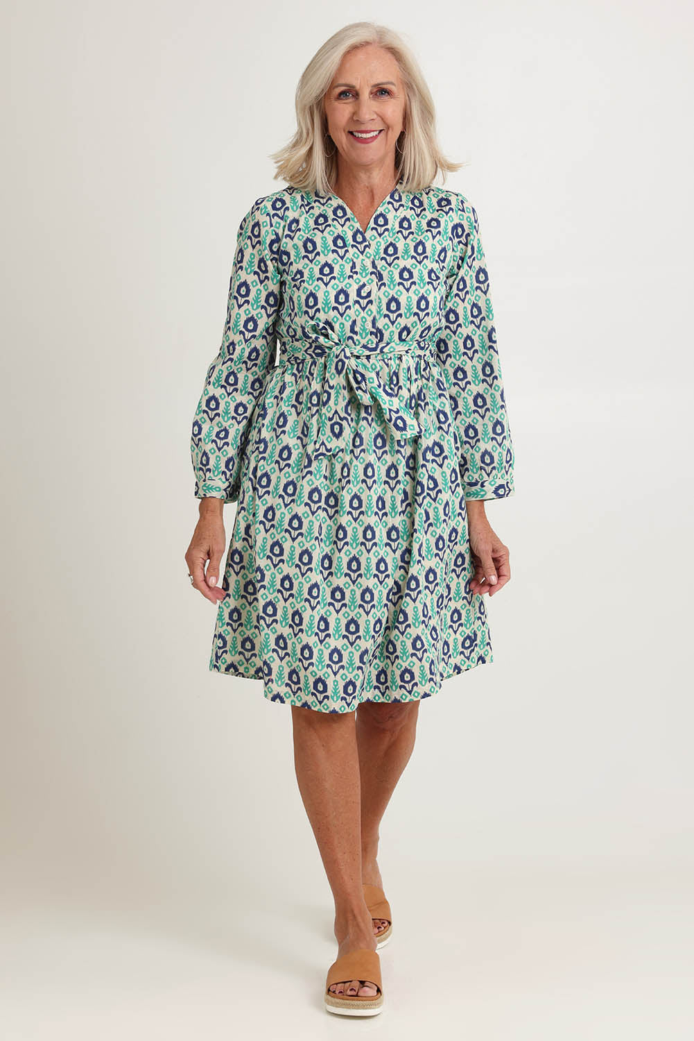 Model Sandy wearing size S of the Heidi Dress in colour Ikata, from the front, showing the whole outfit