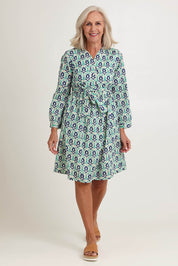 Model Sandy wearing size S of the Heidi Dress in colour Ikata, from the front, showing the whole outfit