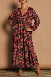 Model Katie wearing size S of the Dehli Dress in colour Chelsea, from the front, cropped image