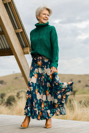 Model Elise wearing the Gigi Maxi Skirt in colour Maya (Blue), from the front, showing the whole outfit