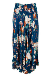 Product shot of the Gigi Maxi Skirt in colour Maya (Blue), from the back