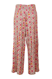 Product shot of the Nat Pant in colour Rhodes (Pink), from the back